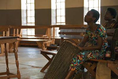 Woman playing huge drum in church