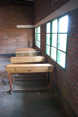 Empty classroom with desks and windows