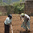 Women cultivating a garden Women cultivating a garden