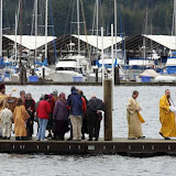 Members of St. Elizabeth Orthodox Mission, the only Easter Orthodox church in Kitsap, finish a Theophany ceremony at the Oyster Plant Park dock in Poulsbo on Tuesday. The ceremony represents the baptism of Jesus. LARRY STEAGALL | KITSAP SUN