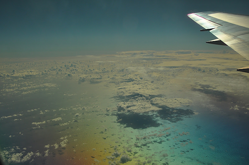 view of clouds and sky from airplane window