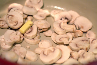 picture of mushrooms in dutch oven with butter