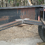 We added diagonal supports with scrap angle iron all through the trailer. We started centered on the axles and worked forward and then back.