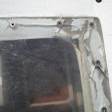 The windows show signs of wear but are holding watertight.