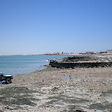 The tide is low and you can see how far it comes up by the boat ramp.