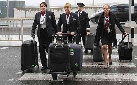 British Airways staff arrive at Terminal 5 at Heathrow