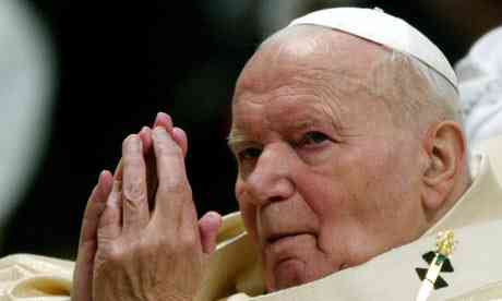Pope John Paul II praying at the Vatican in 2004