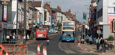 Buses on Friargate selling street, Preston city centre Lancashire