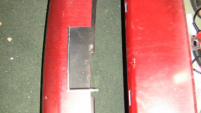 Cleaning up the cut fascia with door trim.