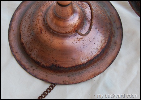 rusted metal bird feeder