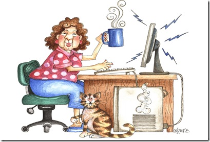lady and her cats at the computer