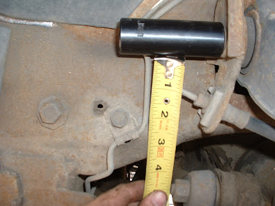 Alright.  Drivers side and passenger side are lined up. Think of it like youre holding a broom stick level with both hands.  If you move one hand up, its going to push the other side down.  You want the idler arm at the exact same height as the pitman arm on the other side so the steering remains aligned.
