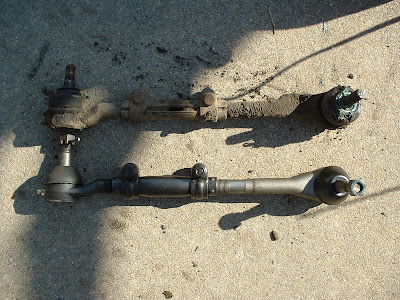 Old one out.  Now for the new one.  I tried to adjust the new one to the same length of the old one.  This will help keep the car close to being aligned correctly.  But its going to have to go into a shop for a professional alignment after all this work anyway.
