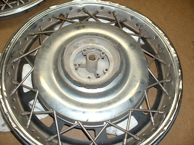 Once the outer spokes are removed, you can remove the inner cover.