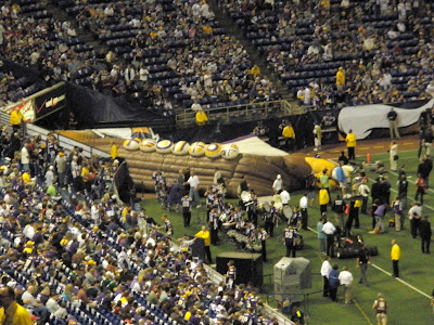 Airing up inflateable boat for the players to run through.
