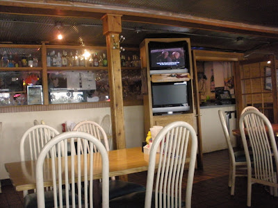 Theyre showing Grumpy Old Men on the TV!  What are the odds?  Oh see the small ice fishing pole below the TV thats the Green Hornet!