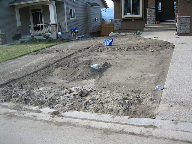 Digging trenches for sprinklers