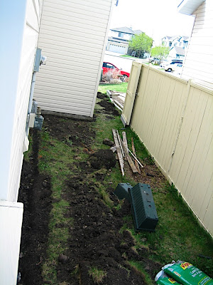 Trench along side of house