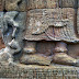 Perhaps the most intriguing puzzle presented by Sikhoraphum's south devata is the position of her feet, with the pronounced raised toes and position of walking on the edge of the foot. Classical dance in Cambodia and Thailand does not duplicate this step, yet it is also seen at Angkor Wat and was certainly an important part of rituals. Read the full story on http://www.devata.org