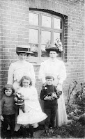 Gwen Greenough as a child with mother, and wife and child of the porter at Upton Station
