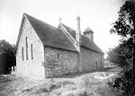St Mary's Church. The church exterior from the north-east showing the flint-faced chancel and nave and timber bell turret, as well as some Norman survivals such as windows. Copyright © Oxfordshire County Council Photographic Archive. Reproduced with the kind permission of Oxfordshire Studies. This photograph may be purchased from their Heritage Search web site at http://www.oxfordshire.gov.uk/heritagesearch