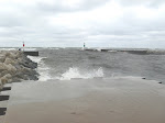 Water flying up the breakwall at photographer John Fleming. http://keithwikle.com