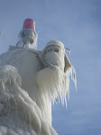 Close up view of the moustache and bearded ice on the lights of the Saugatuck channel. http://keithwikle.com