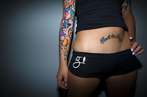 Women#39;s tattoo on the elly 9.