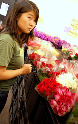 Doesnt she looked thrilled to be picking out flowers?!