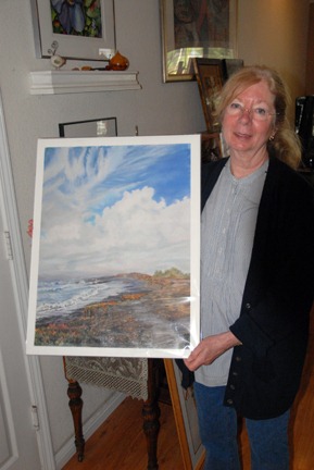 [Susan Goodmundson with one of her paintings.[2].jpg]