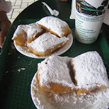 Beignets and coffee.  Standard New Orleans breakfast cuisine.
