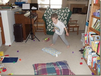 Travis running the obstacle course