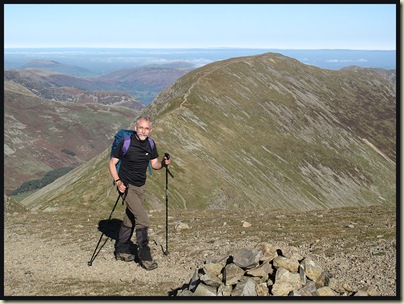 Rick approaches the summit of Fairfield, with St Sunday Crag in the background