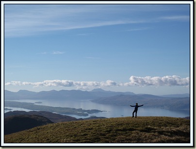 Sue enjoys the wide summit of Fraochaidh