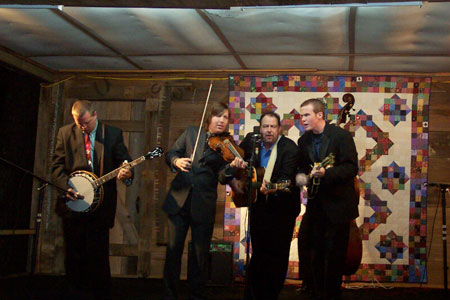 IIIrd Generation Bluegrass Band, with guest mandolinist, Jake Gathright, on stage at Turkey Track