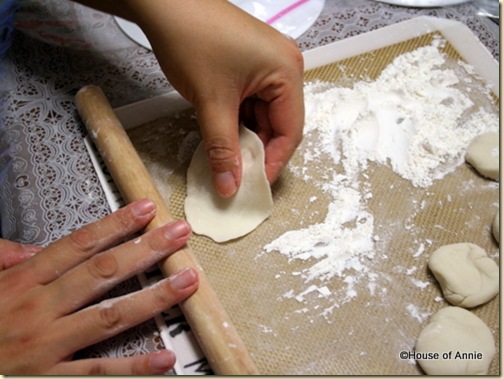 rolling homemade dumpling dough