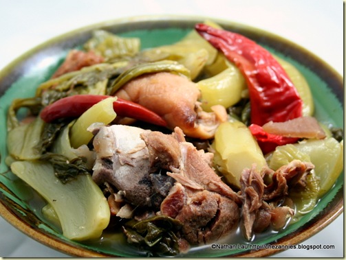 Hot Sour Gai Choy Soup with Roasted Pig's Feet and Duck Heads