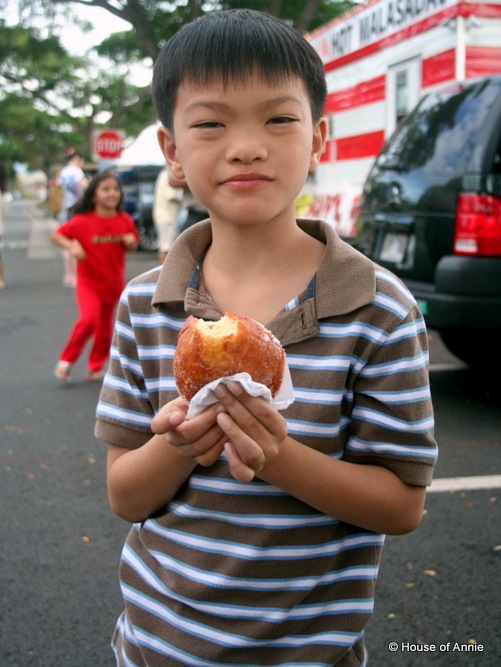 [Daniel eating a malasada[2].jpg]