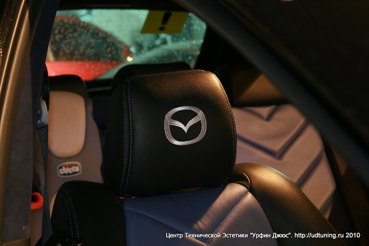 Нанесение вышивки на подголовник Нанесение вышивки Mazda