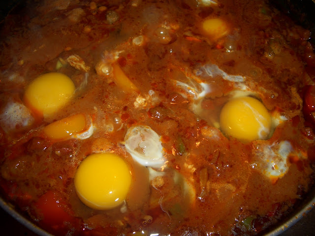 Eggs are in! It's poaching time. You can see four here but there's actually a fifth that was lost to the abyss in the top left.