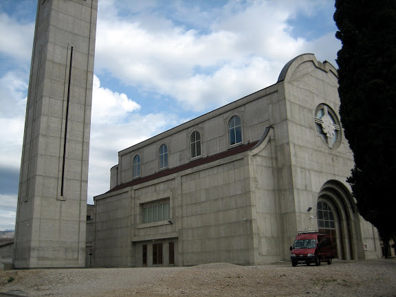 The base of the church with the tall bell tower