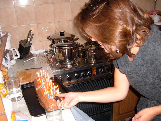 Ivana Lighting the Birthday Log