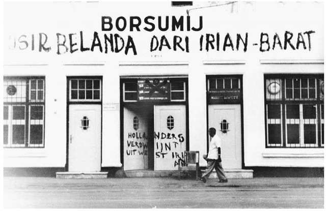 Anticolonial Slogans on an Office Building in Jakarta. When the Indonesian government took control of Dutch-owned commercia properties in the 1950s, Indonesian nationalists celebrated by painting anti-Dutch slogans on the buildings. The text on this wall, photographed in December 1957, reads Usir Belanda Dari Irian-Barat (Expel the Dutch from West New Guinea).