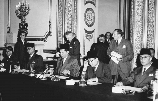 Federation of Malaya Constitutional Conference, London, 1956. The Federation of Malaya gained complete independence from Britain in 1957 and later became part of the nation of Malaysia. Malayan delegates met with British officials in London in 1956 to discuss their country's future relationship with Britain. 
