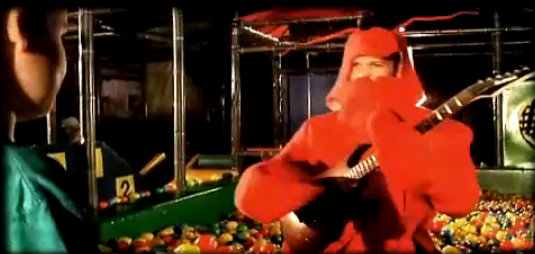 screen captue from avian taxi. lobster playing bass guitar