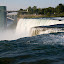The view of the American Falls, the Observation Tower and the Rainbow Bridge (Niagara Falls, USA)