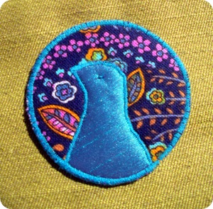 peacock brooch alone