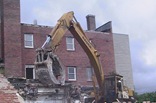 The grapple rips steel supports