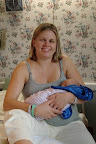 Back in Mommy's arms