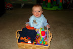Hmmm...presents in a basket. And they call this thing Easter? Okay...I think I like it!